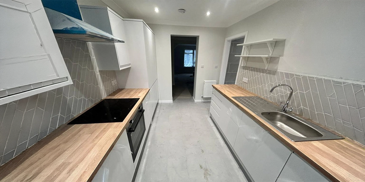 After: Ceiling lighting in a bright and uncluttered kitchen